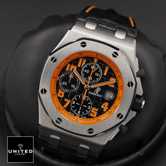 Audemars Piguet Orange Black Dial Replica in the black stand