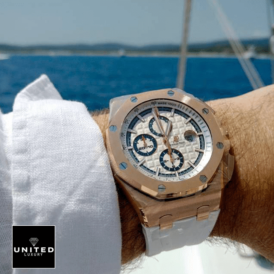 Audemars Piguet Gold Case White Dial Rubber White Bracelet Replica sea background